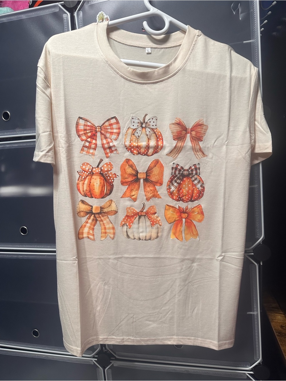 & Other Stories Cream Tee with Orange Pumpkin and Bow Graphic
